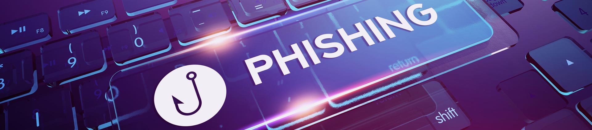 Teclado de computador iluminado por luzes LED. Lê-se: "Phishing" e um ícone de anzol sobre o teclado
